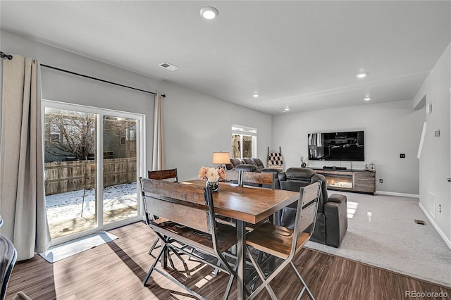 dining room featuring carpet