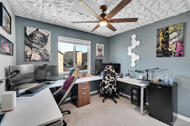 office area with light carpet and ceiling fan