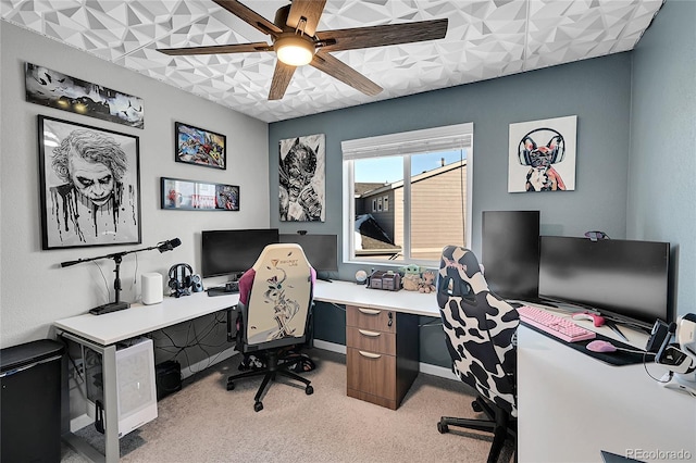 office space with light colored carpet and ceiling fan