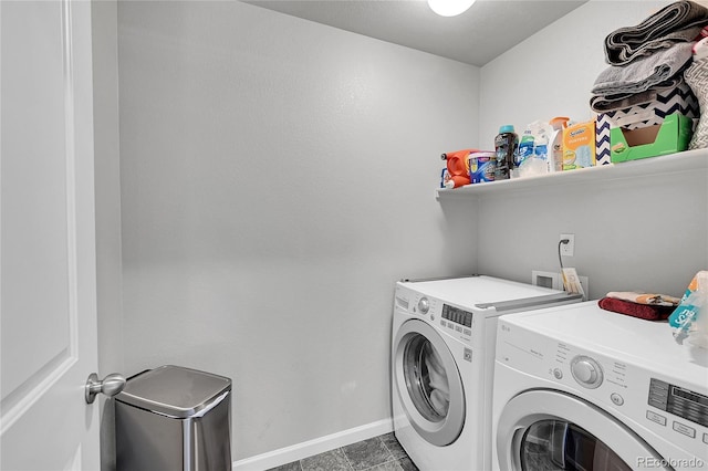 washroom with washer and clothes dryer