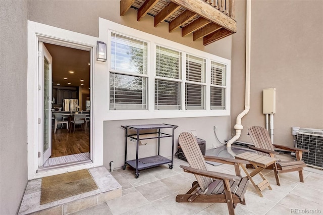 view of patio / terrace with central AC unit