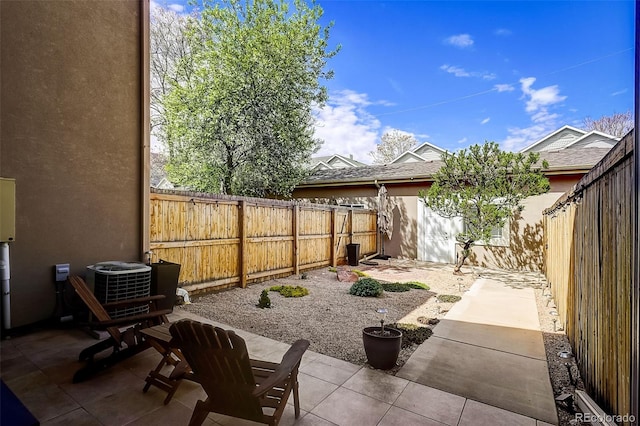 view of patio / terrace featuring central AC and a fenced backyard