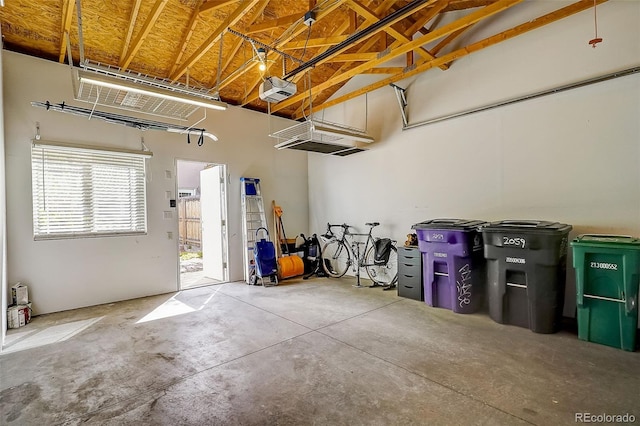 garage featuring a garage door opener