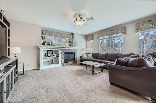 14096 Roaring Fork Cir, Broomfield, CO 80023 - carpeted living area featuring ceiling fan and a tiled fireplace