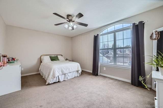 14096 Roaring Fork Cir, Broomfield, CO 80023 - bedroom featuring light colored carpet and a ceiling fan