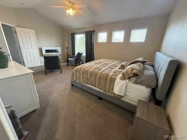14096 Roaring Fork Cir, Broomfield, CO 80023 - carpeted bedroom with vaulted ceiling and ceiling fan