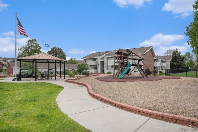 10150 E Virginia Ave Unit 7-304, Denver, CO 80247 - communal playground featuring a gazebo and a residential view