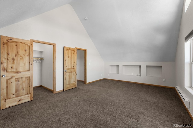 5844 Middle Fork Vis, Fairplay, CO 80440 - additional living space featuring vaulted ceiling, a baseboard heating unit, and dark carpet