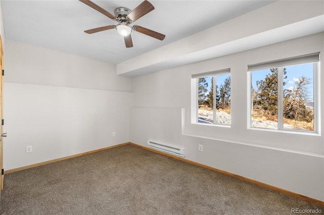 5844 Middle Fork Vis, Fairplay, CO 80440 - carpeted empty room with a baseboard heating unit and ceiling fan