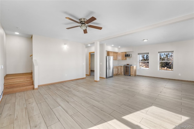 5844 Middle Fork Vis, Fairplay, CO 80440 - unfurnished living room with a ceiling fan, stairway, recessed lighting, and light wood finished floors