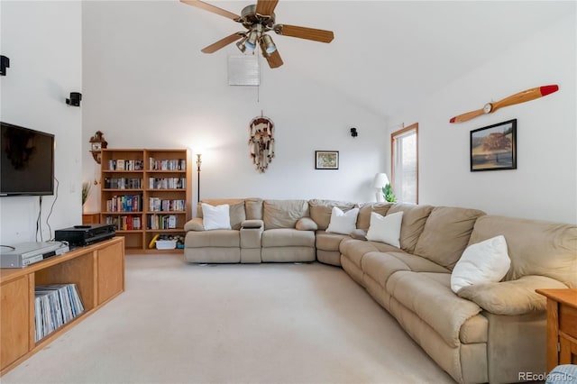 carpeted living area with high vaulted ceiling and a ceiling fan