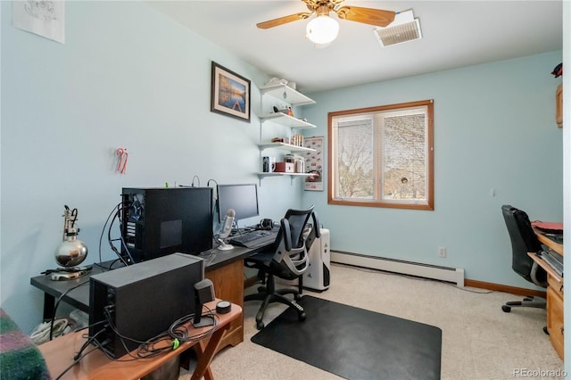 carpeted home office with a ceiling fan, visible vents, baseboard heating, and baseboards