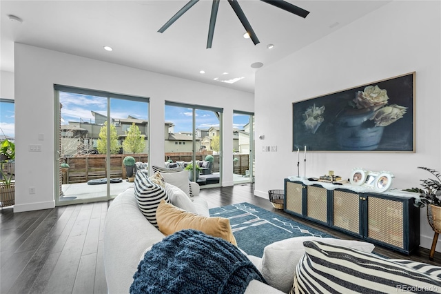 living area with recessed lighting, baseboards, ceiling fan, and hardwood / wood-style flooring