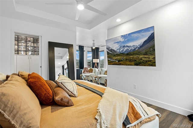 bedroom with baseboards, ceiling fan, recessed lighting, and wood finished floors