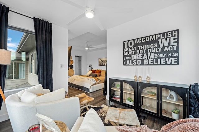 bedroom featuring access to outside, a ceiling fan, and wood finished floors