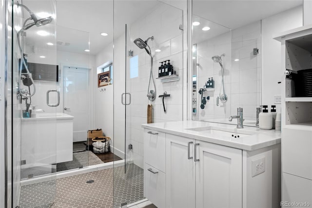 full bathroom with vanity, recessed lighting, a stall shower, and tile patterned floors