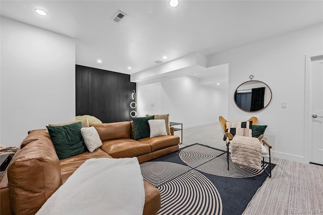 living area featuring baseboards, carpet flooring, and recessed lighting