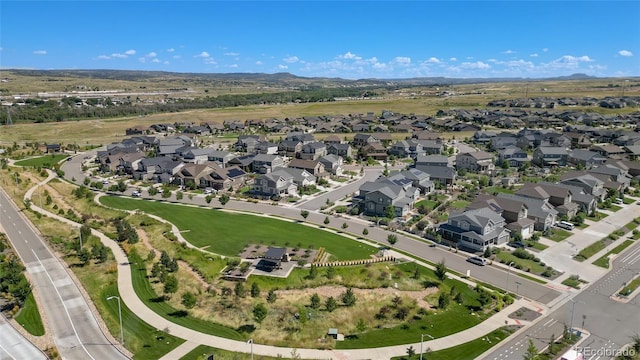 birds eye view of property featuring a residential view and a mountain view