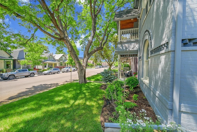 444 S Pearl St, Denver, CO 80209 - view of green lawn featuring a residential view and a balcony