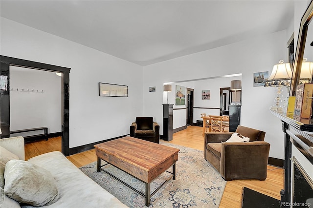 444 S Pearl St, Denver, CO 80209 - living room featuring light wood-style floors and baseboard heating