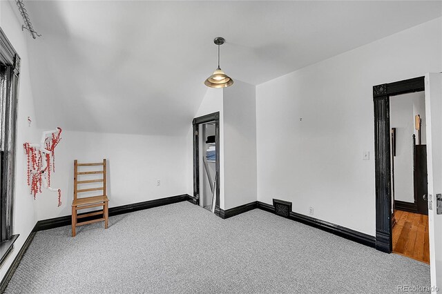 444 S Pearl St, Denver, CO 80209 - additional living space with carpet and lofted ceiling
