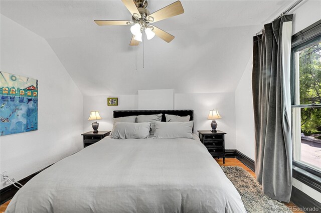 444 S Pearl St, Denver, CO 80209 - bedroom with lofted ceiling, wood finished floors, and ceiling fan