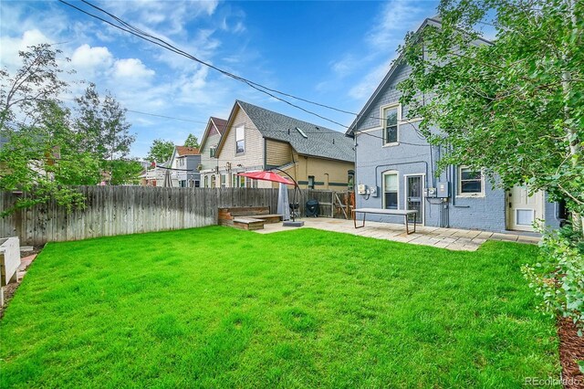 444 S Pearl St, Denver, CO 80209 - fenced backyard featuring a patio