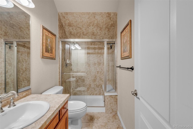 full bathroom with toilet, tile patterned floors, a shower stall, and vanity