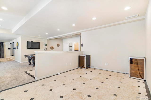 kitchen featuring baseboards, light carpet, visible vents, and recessed lighting