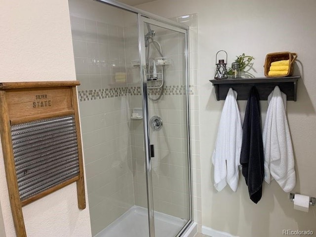 bathroom featuring an enclosed shower