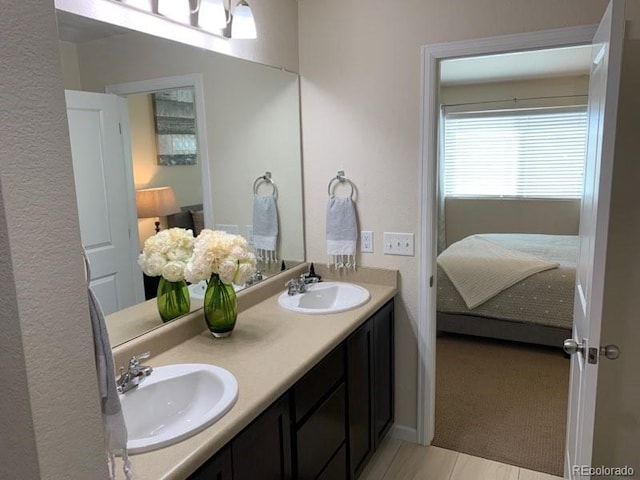 bathroom featuring dual vanity