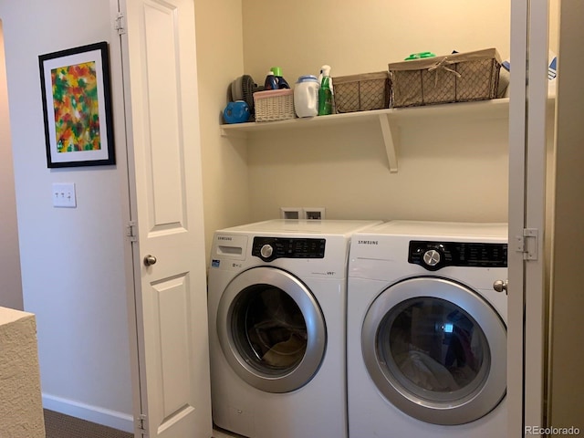 laundry room featuring separate washer and dryer