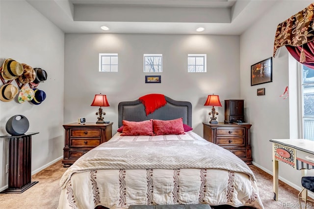 5519 Genoa St, Denver, CO 80249 - bedroom featuring light carpet, recessed lighting, and a tray ceiling