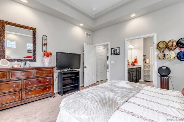5519 Genoa St, Denver, CO 80249 - bedroom with recessed lighting, light colored carpet, and connected bathroom