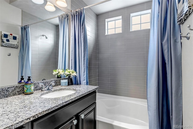 5519 Genoa St, Denver, CO 80249 - bathroom with vanity and shower / bath combination with curtain