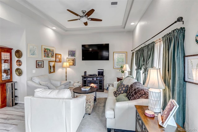 5519 Genoa St, Denver, CO 80249 - living room featuring ceiling fan, recessed lighting, and a raised ceiling