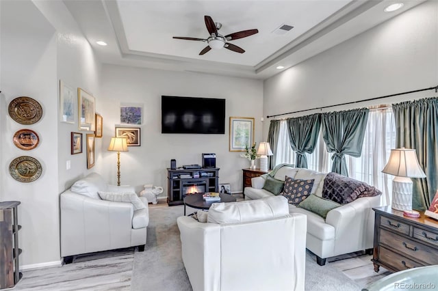 5519 Genoa St, Denver, CO 80249 - living room featuring ceiling fan, a raised ceiling, and recessed lighting