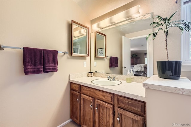 6432 E Jamison Cir S, Centennial, CO 80112 - bathroom with vanity and connected bathroom