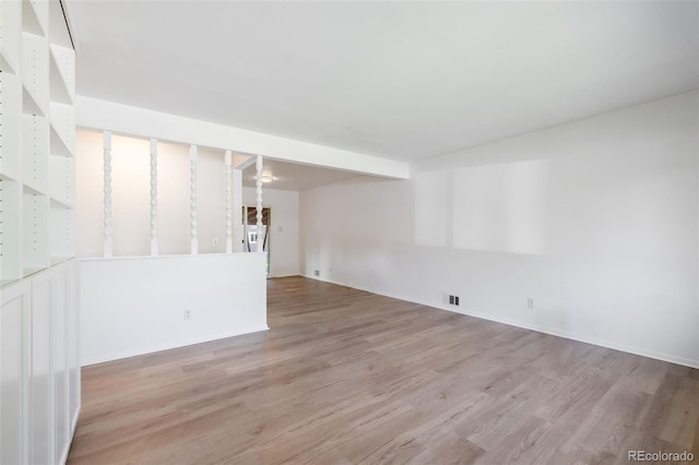 empty room with light wood-type flooring