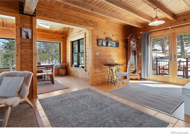 1666 High Creek Rd, Fairplay, CO 80440 - tiled dining space with wood ceiling with exposed beams and wood walls