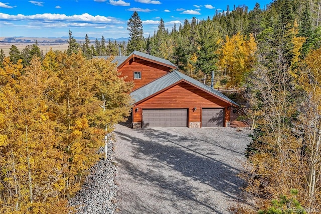 1666 High Creek Rd, Fairplay, CO 80440 - log home with gravel driveway and a mountain view