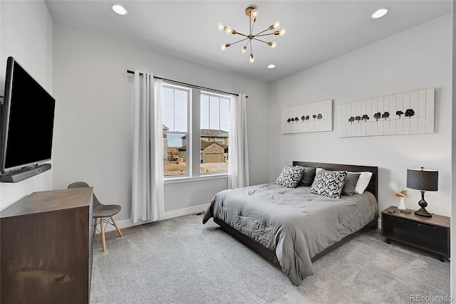 bedroom with light carpet and an inviting chandelier