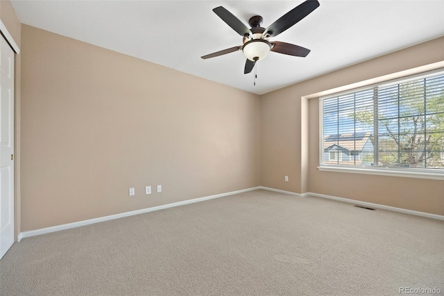 8985 Edgewood Ln, Highlands Ranch, CO 80130 - carpeted spare room featuring ceiling fan and baseboards