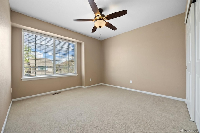 8985 Edgewood Ln, Highlands Ranch, CO 80130 - carpeted empty room featuring baseboards and ceiling fan
