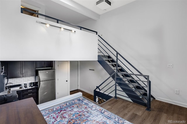 2193 Arapahoe St Unit 15, Denver, CO 80205 - stairs with wood finished floors and baseboards