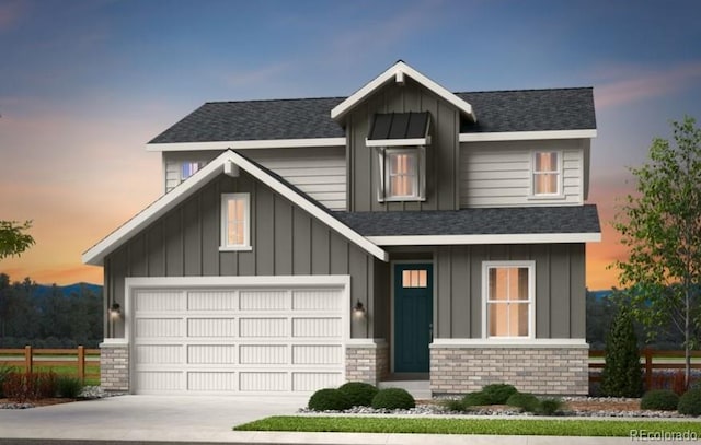3343 N Catawba Way, Aurora, CO 80019 - view of front of house featuring a garage, fence, concrete driveway, board and batten siding, and roof with shingles