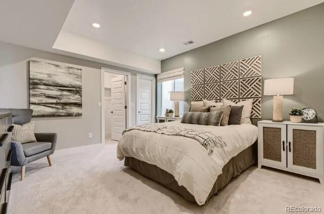 3343 N Catawba Way, Aurora, CO 80019 - bedroom featuring recessed lighting, visible vents, and light colored carpet