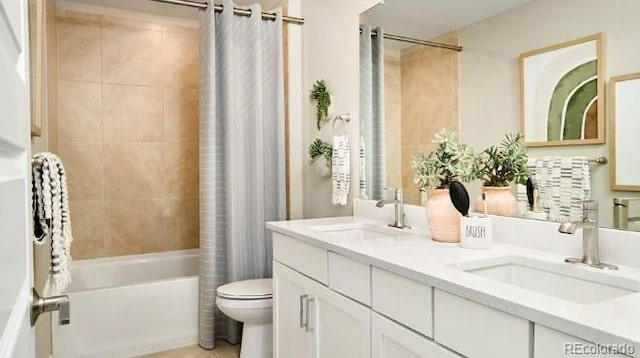 3343 N Catawba Way, Aurora, CO 80019 - bathroom with a sink, double vanity, toilet, and shower / bathtub combination with curtain