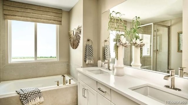 3343 N Catawba Way, Aurora, CO 80019 - bathroom with a stall shower, a bath, double vanity, and a sink