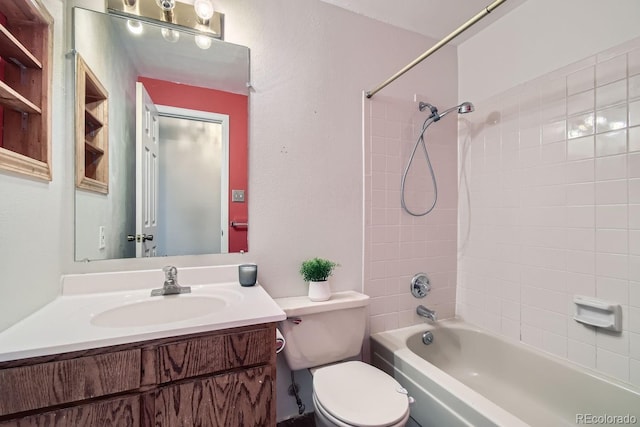 bathroom with vanity, toilet, and bathtub / shower combination
